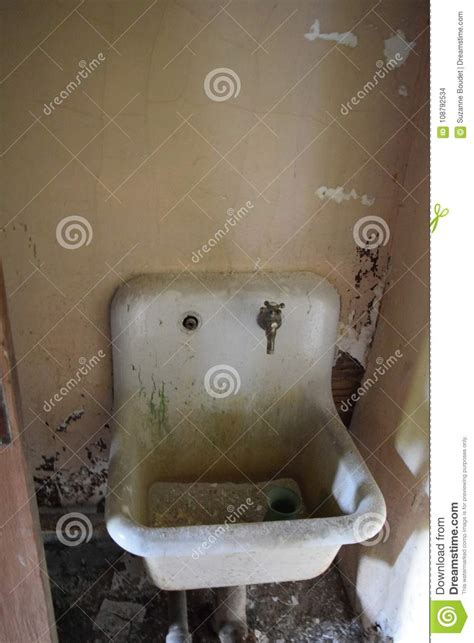 Caulk fills this gap to make your counter and sink watertight, while helping to eliminate. Out of order sink stock photo. Image of ceramic, building ...