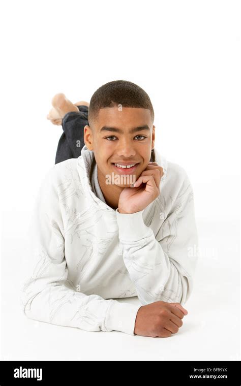 Studio Portrait Of Smiling Teenage Boy Stock Photo Alamy