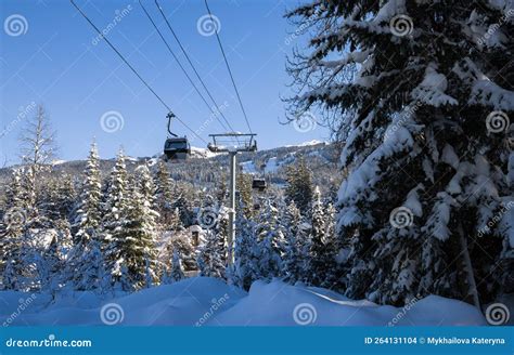 Ski Gondola Lift In Mountains Ski Attraction Mountains Winter Landscape View Stock Photo