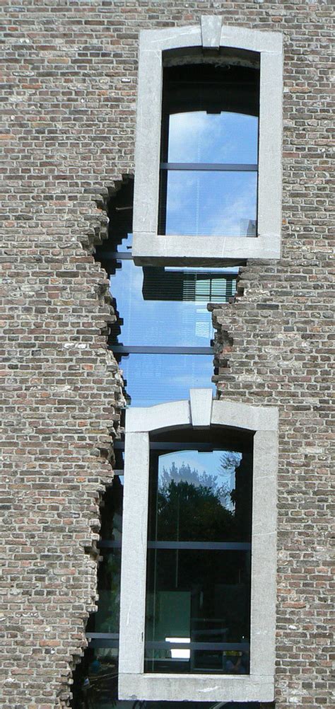 Really Interesting Cracked Building Window Design In The Netherlands Pics