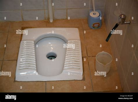 squat turkish toilet in bathroom in famagusta turkish republic of Stock