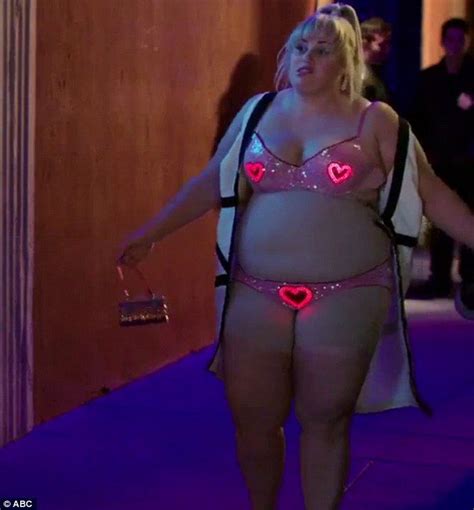 Voluptuous Rebel Wilson Almost Lets It All Hang Out In Flashing Neon Underwear In Clip From New