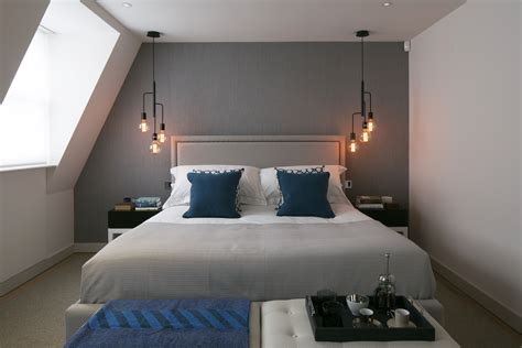 When choosing pendants for a master bedroom, you gotta consider if you want them to be the feature. Master bedroom, grey silk wallpaper, bedside pendant ...