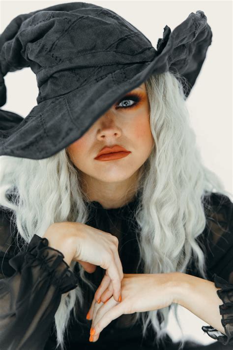 Portrait Of A Beautiful Woman In A Witch Costume · Free Stock Photo