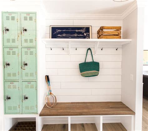 This mudroom has plenty of cabinetry to store household items, while the laundry appliances are cleverly tucked underneath the counter to add surface space. Vintage Mudroom with Mint Green Metal Locker Cabinets ...