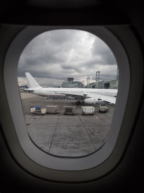Airplane At Airport Through Airplane Window Stock Image Image Of