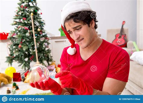 The Man Cleaning His Apartment After Christmas Party Stock Image Image Of Cleaning Happy