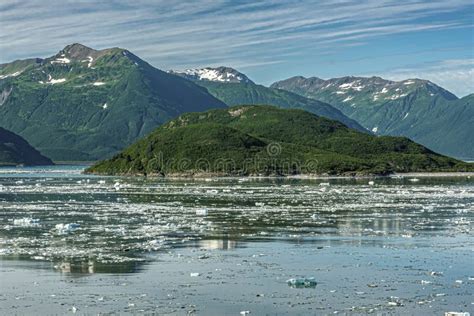 Floating Ice And Green Island In Disenchantment Bay Alaska Usa Stock