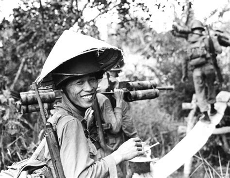 Vietnam War 1965 A Vietnamese Soldier Wears The Traditiona Flickr