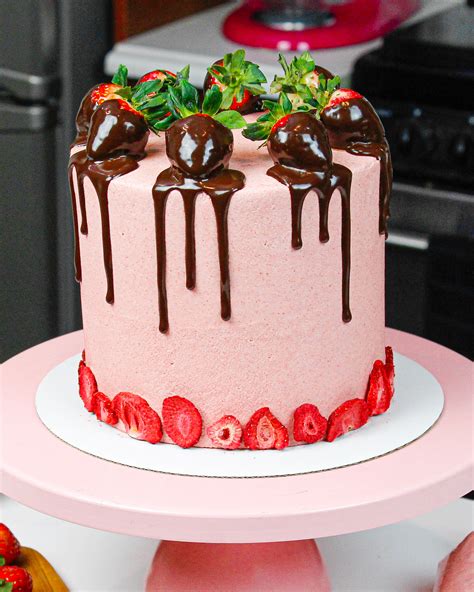 2 tier chocolate drip cake with strawberries strawberries and cream chocolate cake confessions