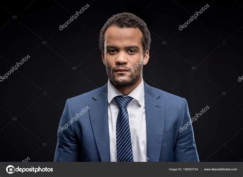 Handsome Businessman Looking At Camera — Stock Photo © Dmitrypoch