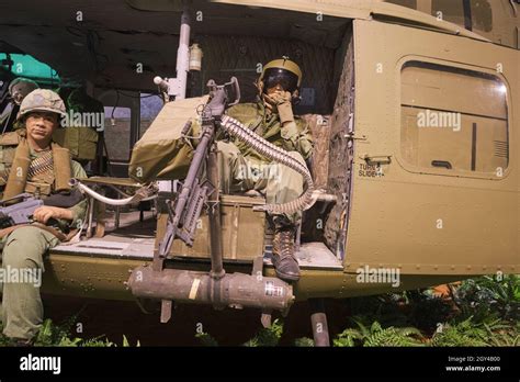 The Gun Crew In A Bell Uh Ih Huey Helicopter During The Vietnam War At