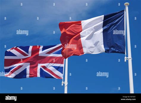 The Flags Of The United Kingdom And France The British Union Jack And