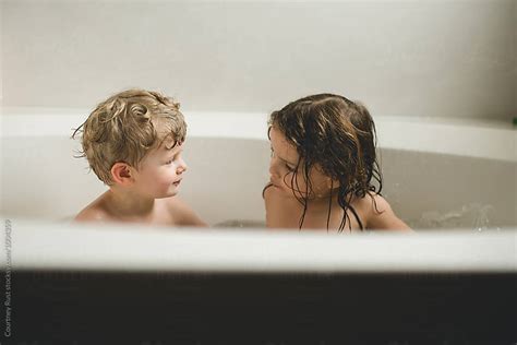 Brother And Babe Talking During Bath Time Stock Image Everypixel