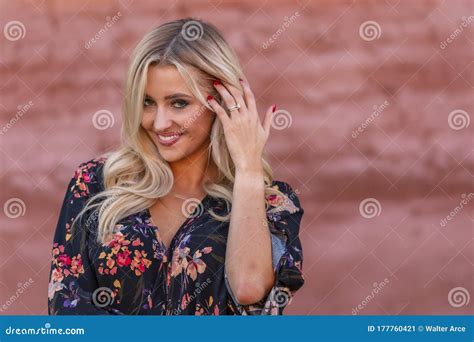 A Lovely Blonde Model Enjoys An Autumn Day Outdoors In A Small Town Stock Image Image Of Happy