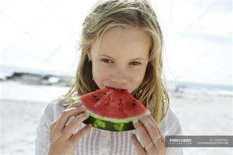 Girl Eating Watermelon In Beach — Outdoors One Person Stock Photo