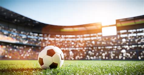 Football Soccer Ball On Grass Field On Stadium Stock Photo Download