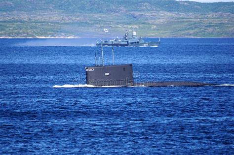A Russian Kilo Class Diesel Electric Submarine Is Diving In Kola Bay