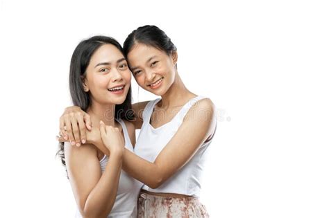 Two Young Girls Carrying Present Stock Image Image Of Cheerful