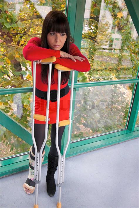 Young Woman With A Leg Cast And Crutches In Hospital Stock Image