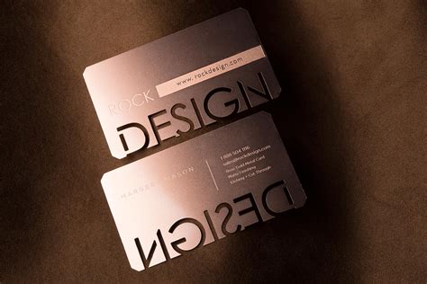 A business card is a small printed card that displays the business and contact information of a company or an individual, such as their name, occupation, phone number, and email address. FREE Striking Rose Gold Metal Business Card Template- RockDesign