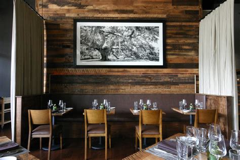 A great build starts with the right lumber. Custom reclaimed wood wall paneling by Perrin Woodworking ...