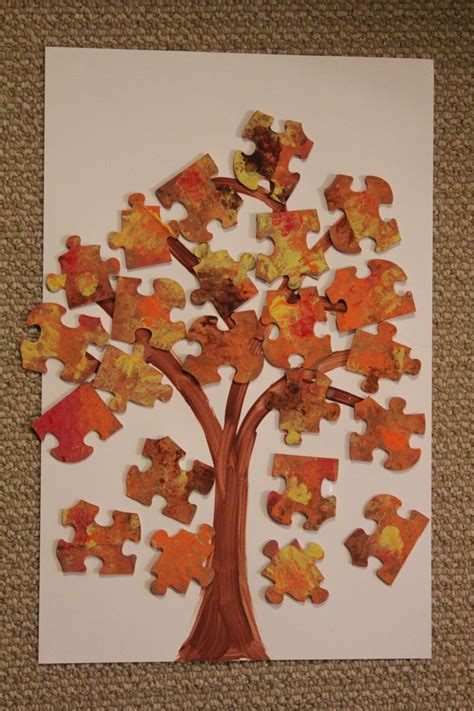 Pull out all the edge pieces that have protrusions on both sides to look like ears. Fall Recycled PuzzleTrees | Jigsaw puzzle crafts, Puzzle ...