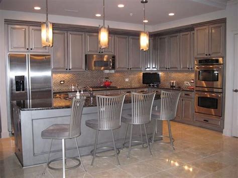 I wouldn't even use eggshell finish. Modern Masters Silver Metallic Paint on kitchen cabinets ...