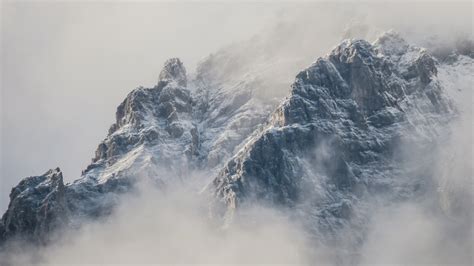 Misty Alps And Snowy Mountains On A Foggy Day In Innsbruck Panoramic