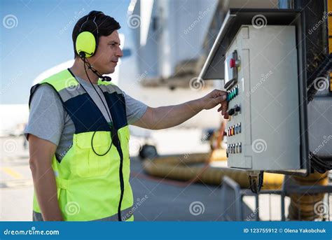 Airport Mechanic Checking Technical Equipment Stock Photo Image Of