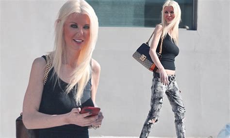 Tara Reid Wears Midriff Baring Vest Top In Los Angeles Daily Mail Online