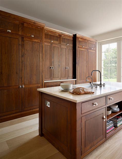 It is a face frame style that is flat on all edges and does not protrude into the storage space or the opening of the cabinet. Maximize Kitchen Space with these 4 Hidden Appliances ...