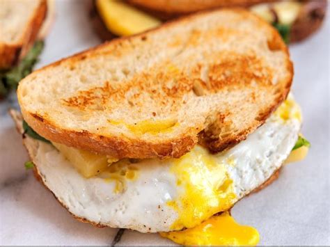 An egg, bacon & cheese sandwich. Healthy Recipes: Multi-Grain Egg Sandwich Recipe