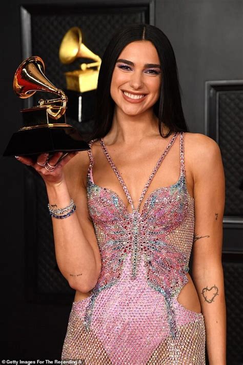 Singer Dua Lipa Strips Down To Her Lingerie During Racy Performance At