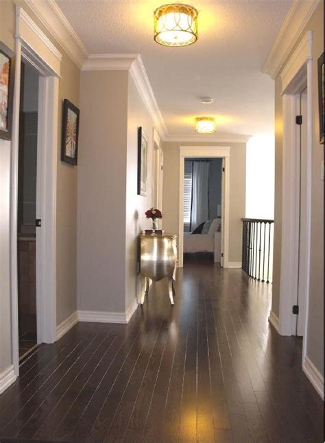 This soothing color palette brings to mind a relaxing walk alongside a beach shore, with the wind running through your hair. Revere Pewter by Benjamin Moore - Love this color paired with white trim and the dark floor ...