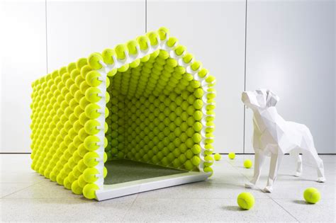 1,438 dog with tennis balls premium high res photos. This modern dog house design is made almost entirely from ...