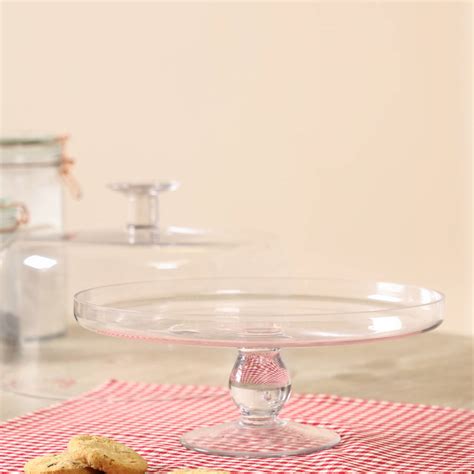 The selection includes various cookies, puffs, cereals. french fancy footed glass cake stand with dome lid by ...