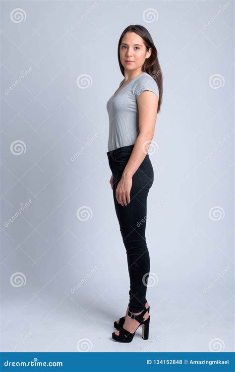 Full Body Shot Profile View Of Young Beautiful Multi Ethnic Woman