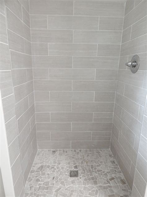 everything from lowe's: shower walls: 6x24 leonia silver porcelain