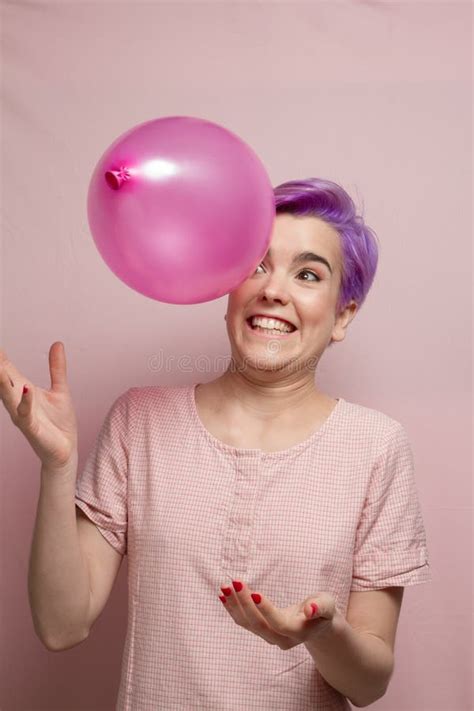 Violet Short Haired Woman In Pink Pastel Laughing And Playing W Stock