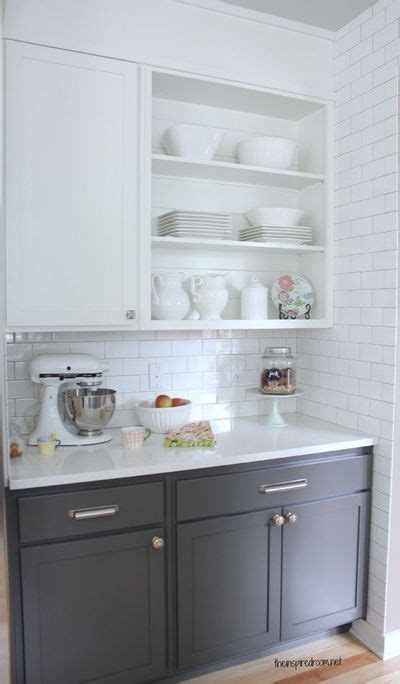 Modern gray and white kitchen with wallpaper and two toned cabinets. gray lower cabinets dove white upper cabinets / For my ...