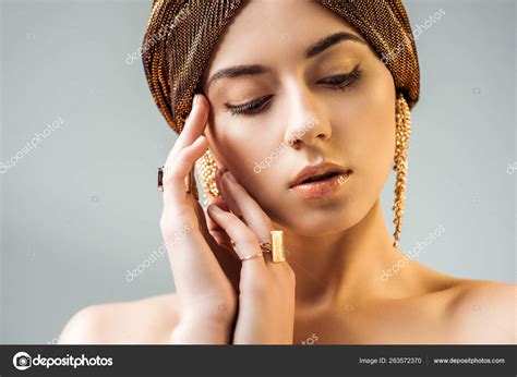 Young Nude Woman Hands Face Shiny Makeup Golden Rings Earrings Stock