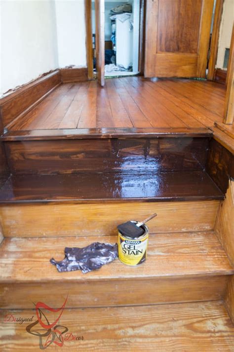 You can sand and stain wood veneer cabinets a darker color. Using Gel Stain over existing stained wood! ~- Designed Decor