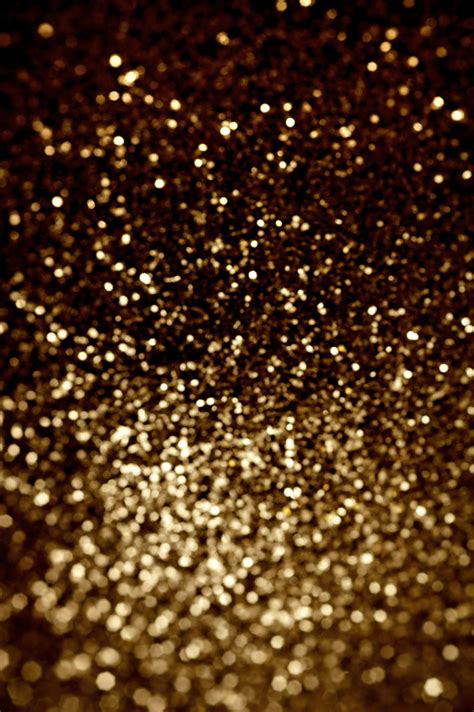 Abstract Background Of Diffuse Gold Glitter Free