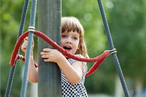 Girl Climbing At Ropes On Playground Stock Image Image Of Cordage