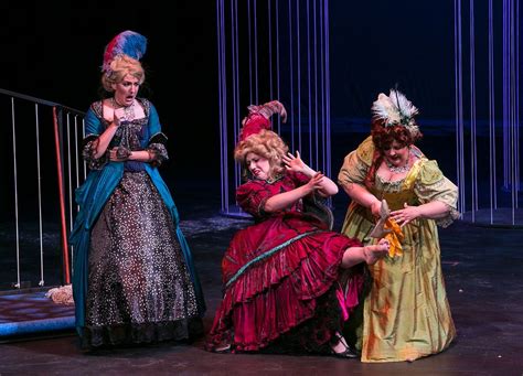 from left cinderella s stepsisters brenna sammon and megan root struggle with cinderella s