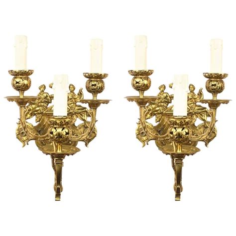 You won't be happy with how it looks. Pair of Baroque Style Bronze Wall Sconce at 1stdibs
