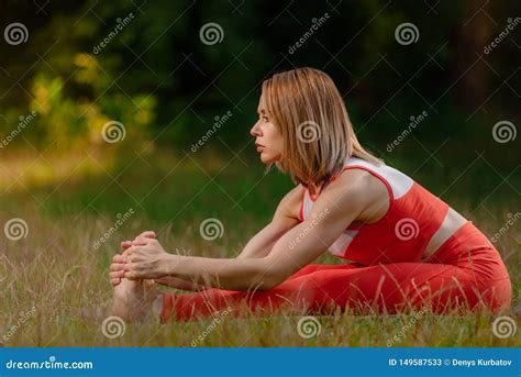 Stretching Legs On Grass Stock Image Image Of Gymnastics 149587533