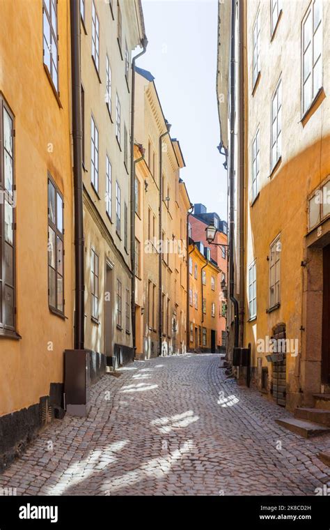 Bright Sun Reflections On Narrow Street In Historic Part Of Stockholm