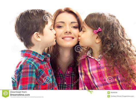 Happy Mother Kissed By Her Daughter And Son Royalty Free